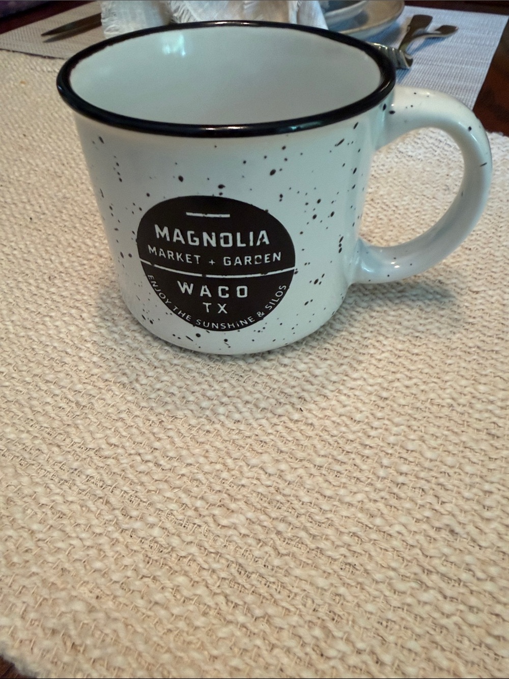 Magnolia White Speckled Mug with Black Logo and Rim